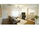 Bright living room features a modern fireplace, built-in bookshelves and neutral decor at 100 E Delafield Ave, Durham, NC 27704