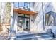 Backyard deck and modern home exterior with wood and steel elements at 103 Inara Ct, Carrboro, NC 27510