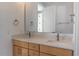 Bathroom featuring double vanity, modern faucets, and a large mirror at 103 Inara Ct, Carrboro, NC 27510