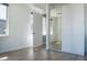 Spacious bedroom features hardwood floors, natural light, and access to ensuite bath and closet at 103 Inara Ct, Carrboro, NC 27510