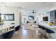 Bright open-concept living space featuring a dining area, comfortable seating, and stylish decor at 103 Inara Ct, Carrboro, NC 27510