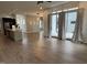 Spacious living room with an open layout, kitchen access, and sliding patio door at 103 Inara Ct, Carrboro, NC 27510
