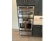 Stainless steel oven and microwave combination with modern accents and dark cabinets at 103 Inara Ct, Carrboro, NC 27510