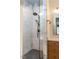 Modern bathroom features a glass shower with marble tile and dark fixtures at 103 Inara Ct, Carrboro, NC 27510