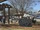 Vibrant town commons featuring vendors, walking paths, and a welcome sign at 103 Inara Ct, Carrboro, NC 27510