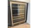A stainless steel wine fridge is adjacent to modern kitchen cabinets at 103 Inara Ct, Carrboro, NC 27510
