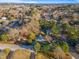 Aerial view of neighborhood with lush trees at 109 Hardee St, Clayton, NC 27520