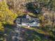 Aerial shot of home nestled among mature trees at 109 Hardee St, Clayton, NC 27520