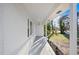 Covered porch showcasing hanging lights and white brick walls at 109 Hardee St, Clayton, NC 27520