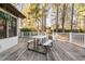Spacious back deck perfect for outdoor entertaining with picnic table and white railing at 1201 Deerfield Dr, Cary, NC 27511