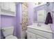 Bathroom featuring a white vanity, framed mirror, and neutral patterned shower curtain at 1201 Deerfield Dr, Cary, NC 27511