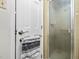 Bathroom featuring a standing shower with glass doors and a towel hanging on the door at 1201 Deerfield Dr, Cary, NC 27511