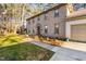 Charming two-story brick home featuring a well-manicured lawn, and attached garage at 1201 Deerfield Dr, Cary, NC 27511