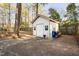 A backyard shed offers additional storage space for tools and outdoor equipment at 1201 Deerfield Dr, Cary, NC 27511