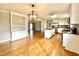 Kitchen that features a granite island, stainless steel appliances, and hardwood floors at 128 Barclay Rd, Durham, NC 27712