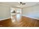 Living room with hardwood floors that opens to the kitchen at 128 Barclay Rd, Durham, NC 27712