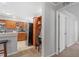 An open-concept kitchen view with stainless steel appliances and access to the dining and living space at 129 Shawnee Dr, Louisburg, NC 27549