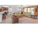 Inviting living room with plush sofas, a warm color palette, and an open layout at 129 Shawnee Dr, Louisburg, NC 27549