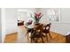 A classic dining room showing hardwood floors, natural light, and view to a comfortable living room at 1304 N Duke St, Durham, NC 27701