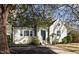 Charming home featuring classic brickwork, complemented by well-manicured landscaping at 1304 N Duke St, Durham, NC 27701