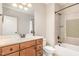 Traditional bathroom featuring a single sink vanity with a white countertop and tub and shower combo at 164 Arabella Ct, Cary, NC 27518