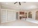 Bonus room featuring a bar and built in bookshelves at 164 Arabella Ct, Cary, NC 27518