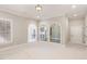 Bonus room with carpeted floors and an arched opening at 164 Arabella Ct, Cary, NC 27518