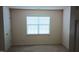 Cozy bedroom with neutral carpet, window with blinds, and ample natural light at 1906 Hawfields Crossing Ln, Mebane, NC 27302