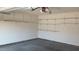 Interior garage shot showing shelving installed on walls at 1906 Hawfields Crossing Ln, Mebane, NC 27302