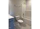 Bright bathroom featuring a white tub-shower combo and a matching toilet for a clean, modern look at 1913 Fishamble St, Fuquay Varina, NC 27526