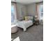 Bedroom with detailed trim, decorative pillows, and natural light at 1913 Fishamble St, Fuquay Varina, NC 27526