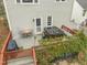 Backyard patio with hot tub and seating area, perfect for relaxing or entertaining at 1928 Jupiter Hills Ct, Raleigh, NC 27604