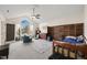 Spacious bedroom featuring a large window, vaulted ceiling, and neutral carpeting at 1928 Jupiter Hills Ct, Raleigh, NC 27604