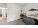 Bedroom with carpeting, closet, and large window providing natural light at 1928 Jupiter Hills Ct, Raleigh, NC 27604