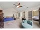 Expansive primary bedroom with vaulted ceiling, sitting area, and serene decor at 1928 Jupiter Hills Ct, Raleigh, NC 27604
