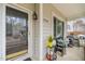 Cozy front porch featuring seating, plants, and a clear view of the home's entrance at 1928 Jupiter Hills Ct, Raleigh, NC 27604