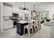 Modern kitchen with island, stainless steel appliances, and sleek design at 2118 Opulent Oaks Ln # 10, Durham, NC 27713