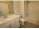 Bathroom featuring a vanity with white cabinets, a mirror, and a shower tub at 2323 Bay Minette Sta # 547, Apex, NC 27502