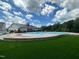 Community pool with splash pad and plenty of seating for all residents to enjoy at 2323 Bay Minette Sta # 547, Apex, NC 27502