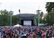 Outdoor venue showcases a concert with large crowds and an impressive stage setup at 2323 Bay Minette Sta # 547, Apex, NC 27502
