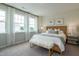 Bright main bedroom with large windows, natural light and neutral tones offer a peaceful retreat at 2323 Bay Minette Sta # 547, Apex, NC 27502
