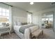 The primary suite features a brick wall and bench seat at 2323 Bay Minette Sta # 547, Apex, NC 27502