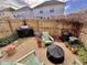 Cozy backyard offering a grill and seating area for outdoor enjoyment and entertaining at 2323 Turtle Point Dr, Raleigh, NC 27604