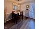 Cozy dining area with a stylish table set, a decorative mirror, and attractive wall decor, illuminated by pendant lights at 2323 Turtle Point Dr, Raleigh, NC 27604