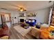 Inviting living room featuring a fireplace, ceiling fan, and a cozy seating arrangement with stylish decor at 2323 Turtle Point Dr, Raleigh, NC 27604