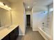 Bathroom features a single sink vanity, neutral walls and tile flooring at 253 Deodora Ln, Cameron, NC 28326