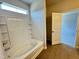 Bathroom with neutral tile, tub, and shower combo at 253 Deodora Ln, Cameron, NC 28326