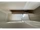 Modern bathroom featuring a toilet with the door partially open and neutral paint at 253 Deodora Ln, Cameron, NC 28326