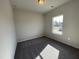 Clean bedroom with window, neutral walls, and carpet flooring at 253 Deodora Ln, Cameron, NC 28326