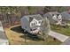 Aerial view of two-story home with manicured lawn at 264 Farrington Dr, Clayton, NC 27520